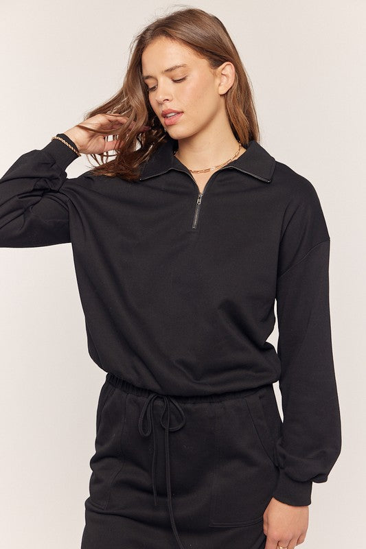 Black quarter zip top